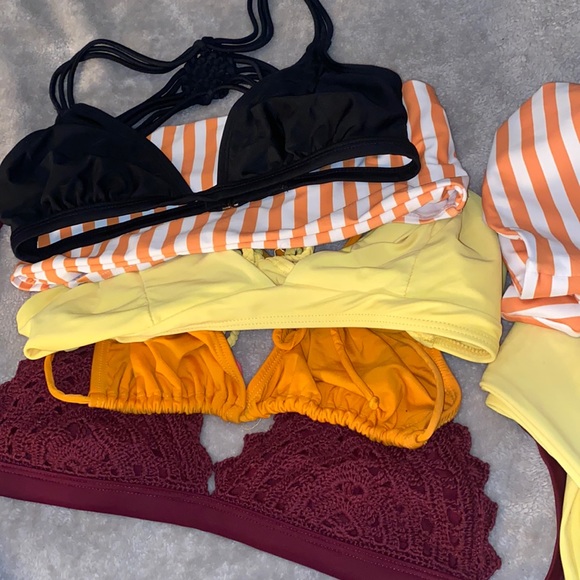 A bunch of tops! two with matching bottoms. All cheecky and small and medium - Picture 1 of 1